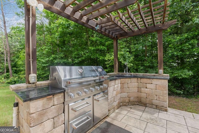 2307 Loughridge Dr, Buford, GA 30519 - view of patio / terrace featuring an outdoor kitchen and a pergola