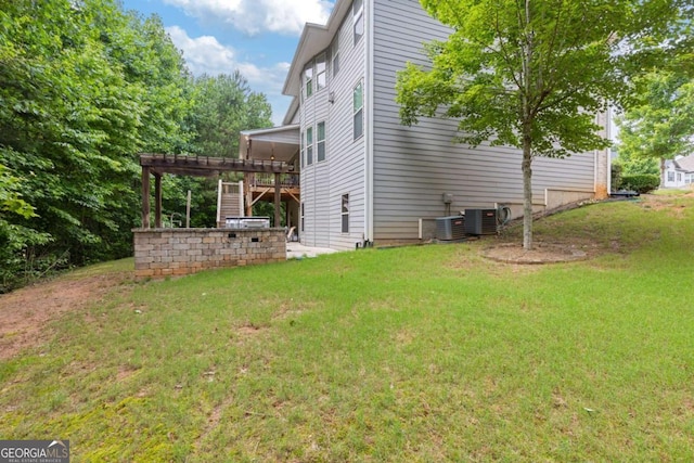 2307 Loughridge Dr, Buford, GA 30519 - view of home's exterior with a wooden deck, stairs, and a lawn