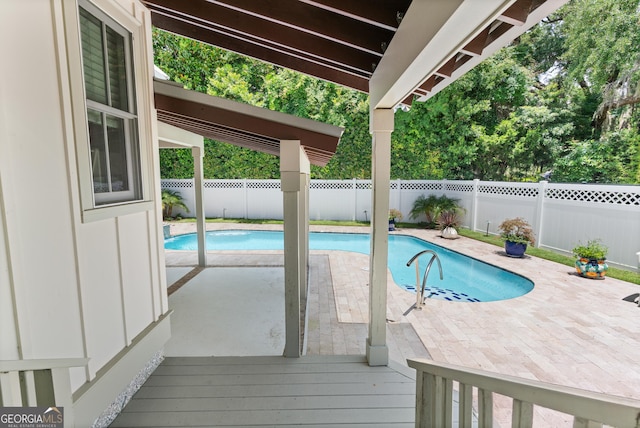31 Frederica Oaks Ln, Saint Simons, GA 31522 - view of pool with a fenced backyard and a patio