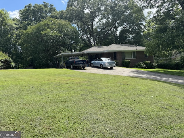 537 Elizabeth Ln SW, Mableton, GA 30126 - view of property exterior featuring driveway and a yard