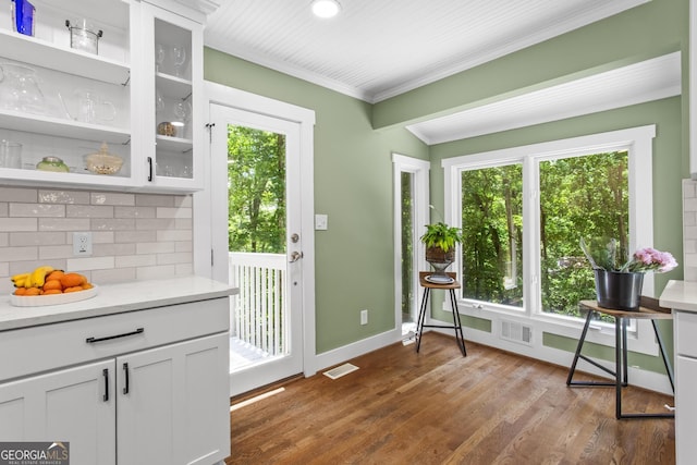 970 Pine Grove Pointe Dr, Roswell, GA 30075 - doorway to outside with plenty of natural light, ornamental molding, and dark wood-style flooring
