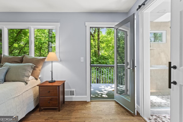970 Pine Grove Pointe Dr, Roswell, GA 30075 - entryway featuring wood finished floors and a barn door