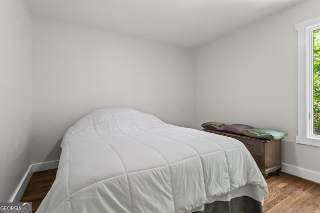 970 Pine Grove Pointe Dr, Roswell, GA 30075 - bedroom with baseboards and wood finished floors