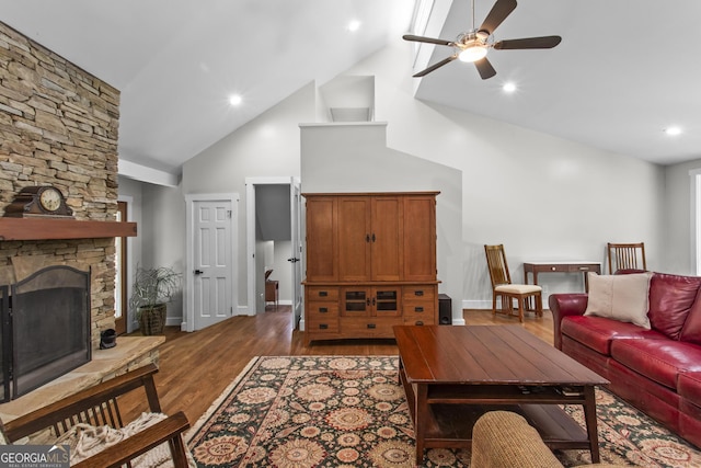 970 Pine Grove Pointe Dr, Roswell, GA 30075 - living area with high vaulted ceiling, a ceiling fan, a stone fireplace, dark wood-style floors, and recessed lighting