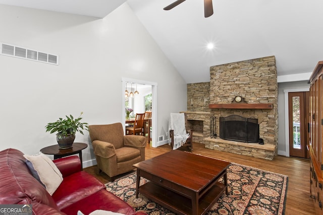 970 Pine Grove Pointe Dr, Roswell, GA 30075 - living area with wood finished floors, healthy amount of natural light, a ceiling fan, a chandelier, and high vaulted ceiling