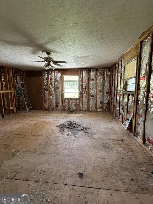 307 Hickman Rd, Forsyth, GA 31029 - misc room with a textured ceiling