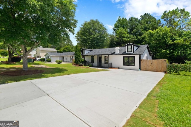 4946 Lake Ridge Trl, Lilburn, GA 30047 - view of front of house with driveway