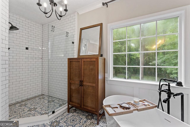 15 Stonewood Way, Sharpsburg, GA 30277 - bathroom with a stall shower, a chandelier, and a freestanding bath