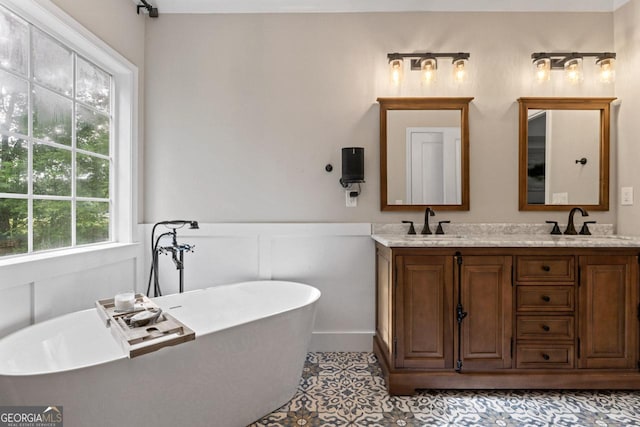 15 Stonewood Way, Sharpsburg, GA 30277 - bathroom with a freestanding bath and double vanity