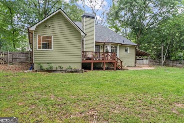 15 Stonewood Way, Sharpsburg, GA 30277 - rear view of property featuring a wooden deck, a fenced backyard, a chimney, crawl space, and stairs