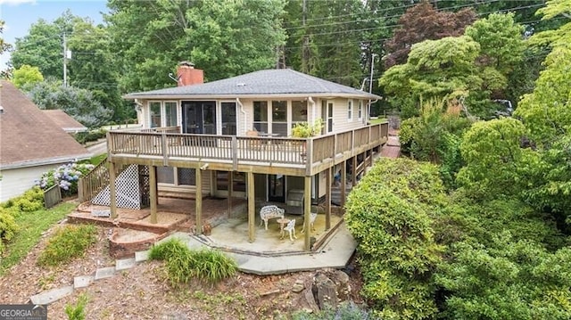 6381 Lakeview Dr, Buford, GA 30518 - back of property featuring a wooden deck, a chimney, a patio, and stairs