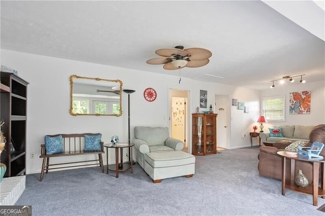 6381 Lakeview Dr, Buford, GA 30518 - carpeted living room with ceiling fan
