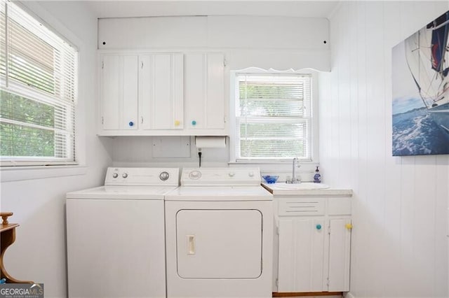 6381 Lakeview Dr, Buford, GA 30518 - laundry area with cabinet space, separate washer and dryer, and wood walls