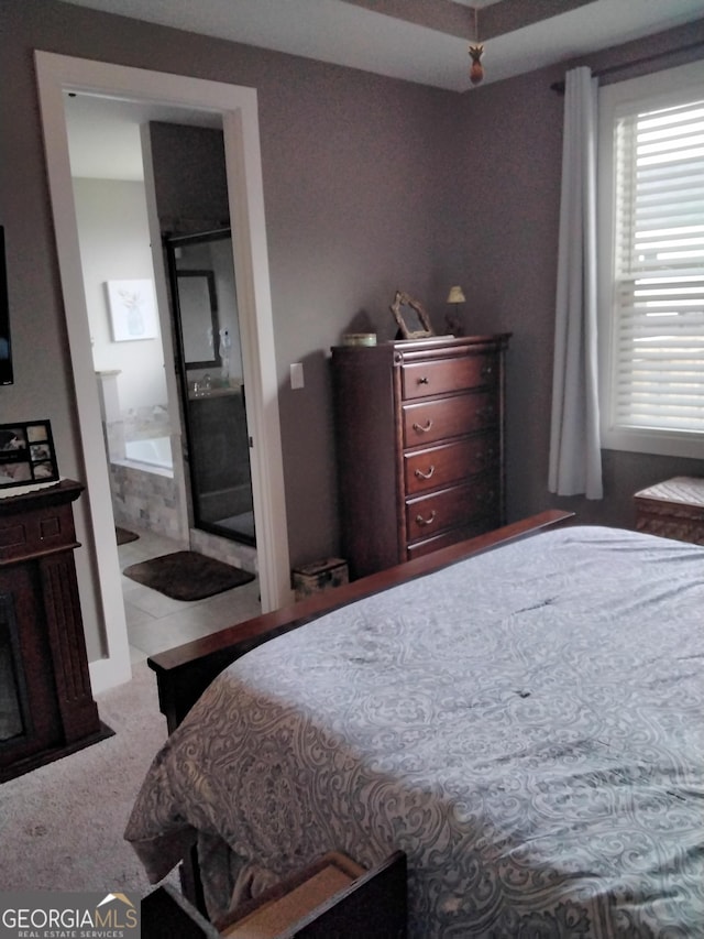 211 Barnyard Way, Perry, GA 31069 - bedroom with ensuite bath and carpet floors