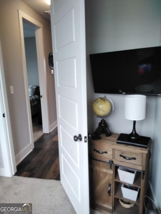 211 Barnyard Way, Perry, GA 31069 - office area with baseboards and dark wood finished floors
