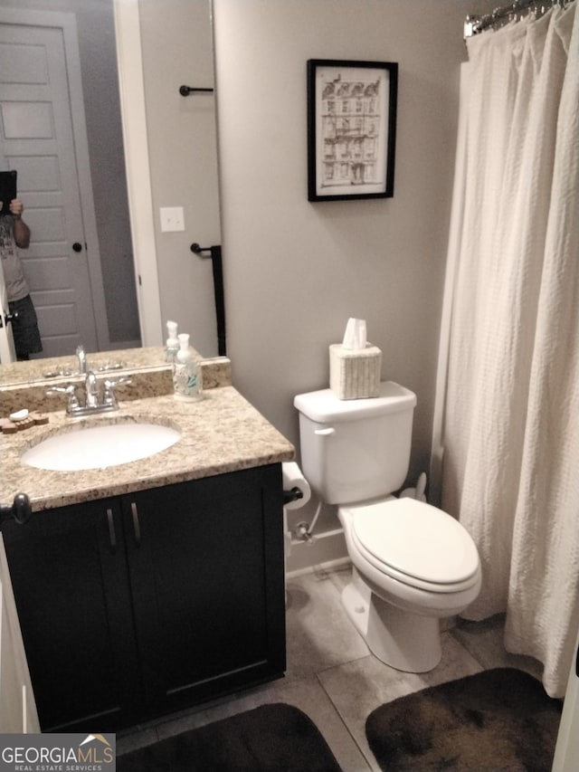211 Barnyard Way, Perry, GA 31069 - bathroom featuring vanity, tile patterned floors, and curtained shower