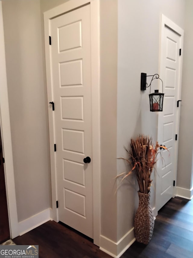 211 Barnyard Way, Perry, GA 31069 - corridor featuring baseboards and dark wood-type flooring