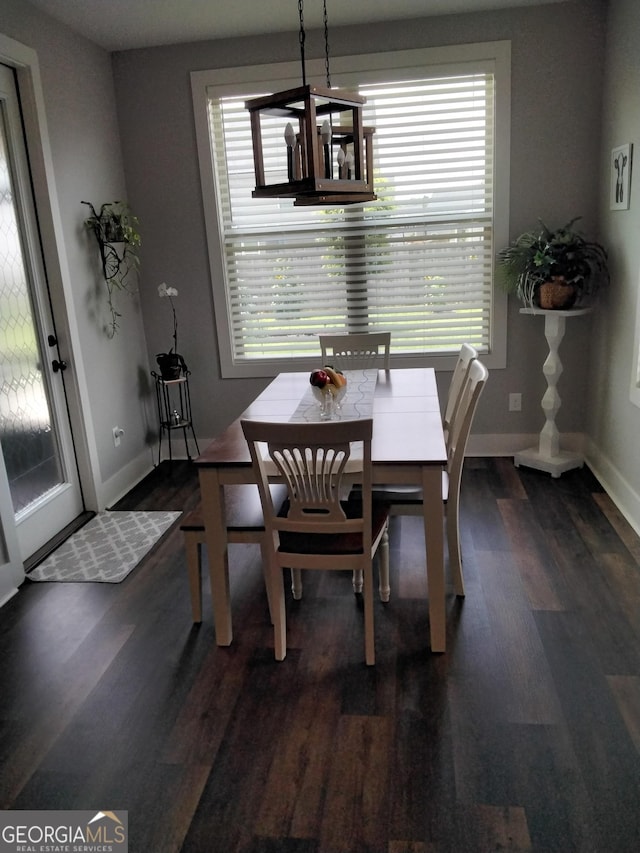 211 Barnyard Way, Perry, GA 31069 - dining area with wood finished floors and baseboards