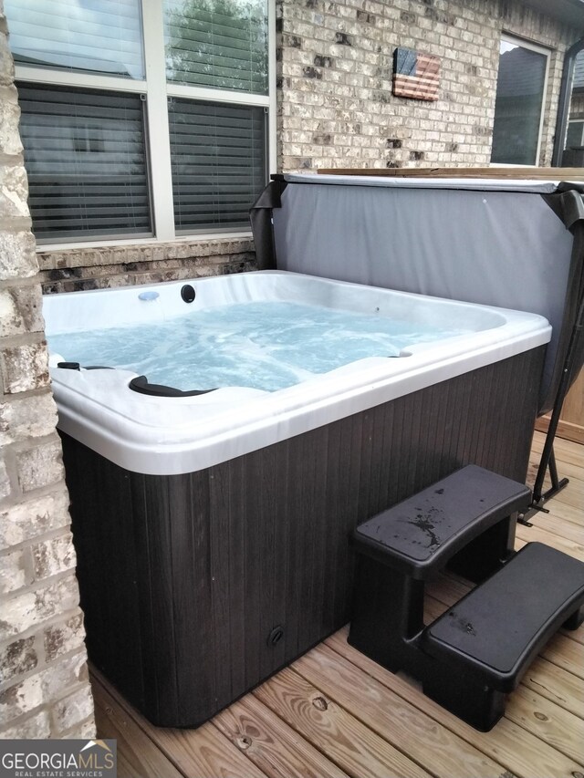 211 Barnyard Way, Perry, GA 31069 - deck with a hot tub