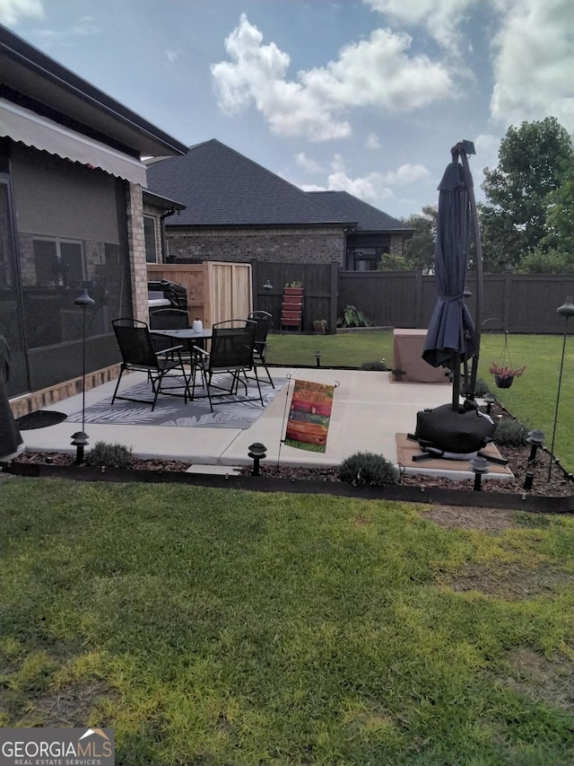 211 Barnyard Way, Perry, GA 31069 - view of yard featuring a patio