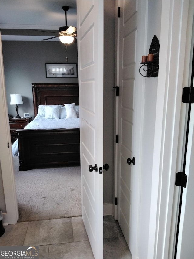 211 Barnyard Way, Perry, GA 31069 - tiled bedroom with carpet floors