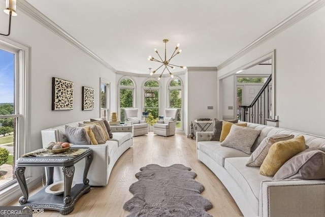 3835 Hickory Branch Trl, Suwanee, GA 30024 - living room featuring a chandelier, healthy amount of natural light, crown molding, and stairs