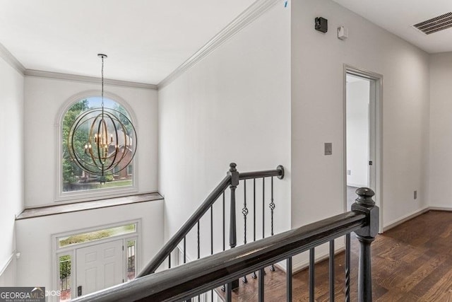 3835 Hickory Branch Trl, Suwanee, GA 30024 - stairs featuring a chandelier, crown molding, and wood finished floors