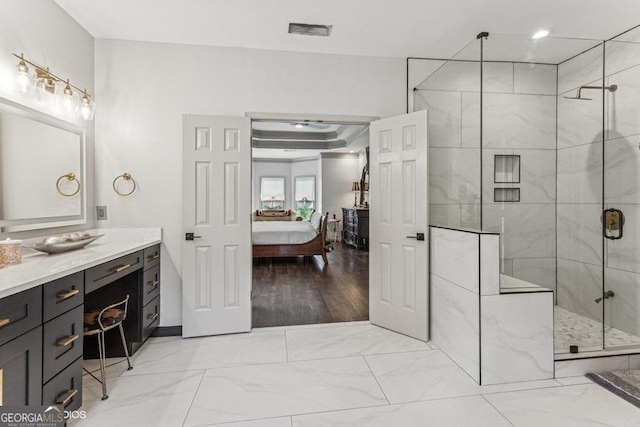3835 Hickory Branch Trl, Suwanee, GA 30024 - ensuite bathroom with a shower stall, vanity, and marble finish floors