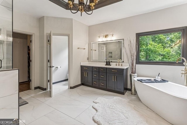 3835 Hickory Branch Trl, Suwanee, GA 30024 - bathroom with vanity, a soaking tub, a chandelier, an enclosed shower, and marble finish floors
