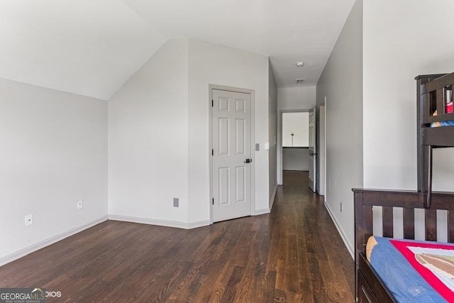 3835 Hickory Branch Trl, Suwanee, GA 30024 - bedroom featuring wood finished floors and lofted ceiling