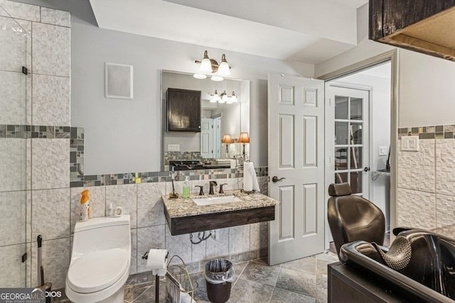3835 Hickory Branch Trl, Suwanee, GA 30024 - bathroom with tile walls and wainscoting