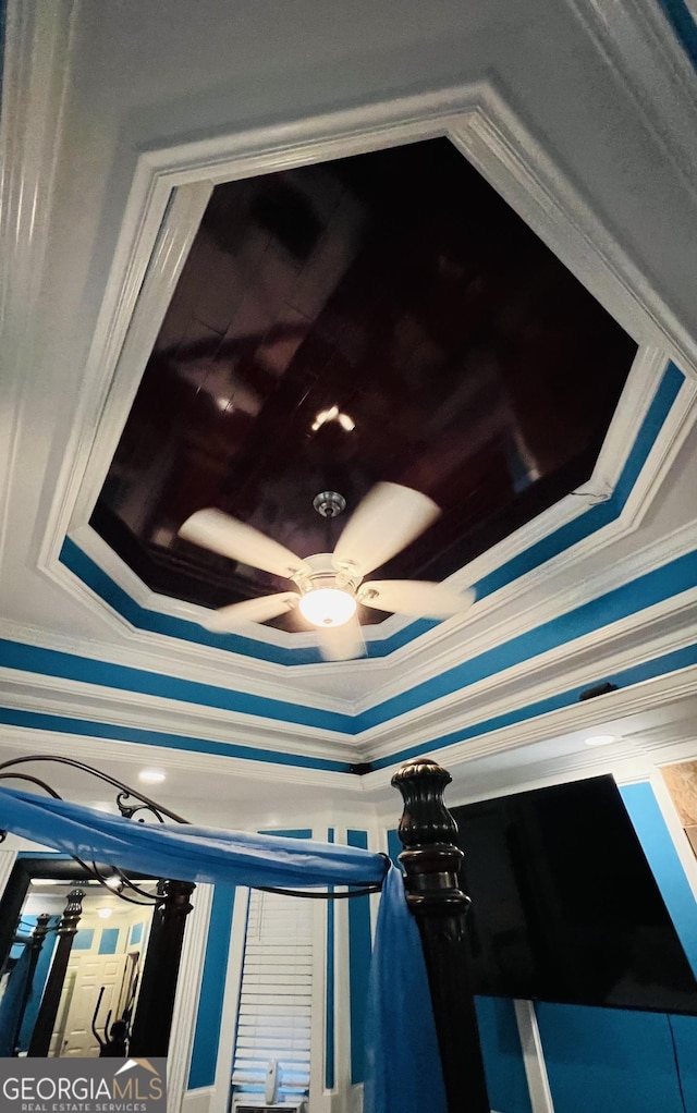 2481 Islands Hwy, Midway, GA 31320 - detailed view of a ceiling fan, ornamental molding, and a raised ceiling