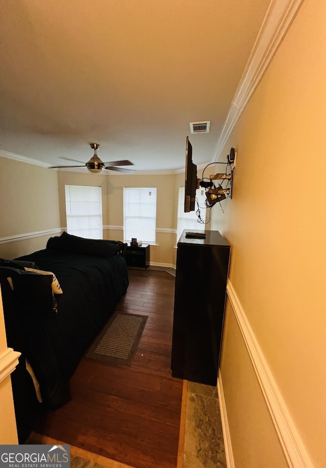 2481 Islands Hwy, Midway, GA 31320 - bedroom with ornamental molding, dark wood finished floors, and a ceiling fan