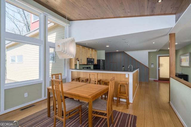 40 Pond Path, Ellijay, GA 30536 - dining space with light wood-style flooring, vaulted ceiling, recessed lighting, wooden ceiling, and stairway