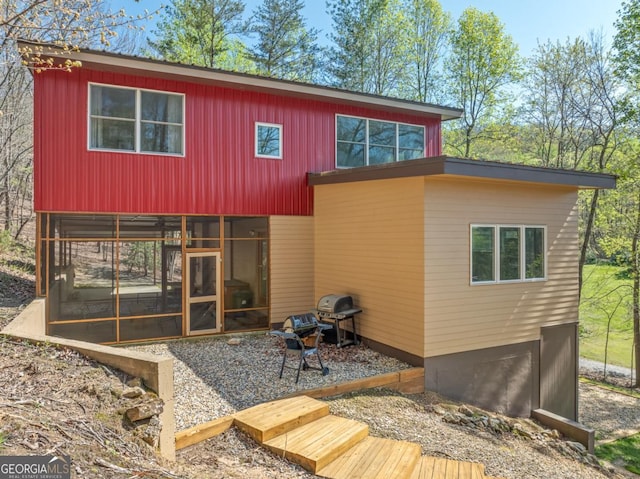 40 Pond Path, Ellijay, GA 30536 - back of house featuring a sunroom