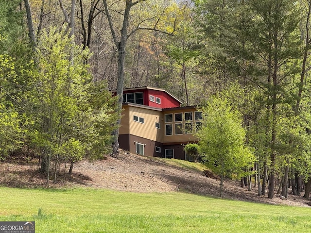 40 Pond Path, Ellijay, GA 30536 - back of house featuring a lawn and a view of trees