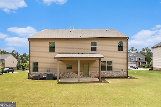 8041 Louis Dr, Locust Grove, GA 30248 - rear view of property with a patio and a yard