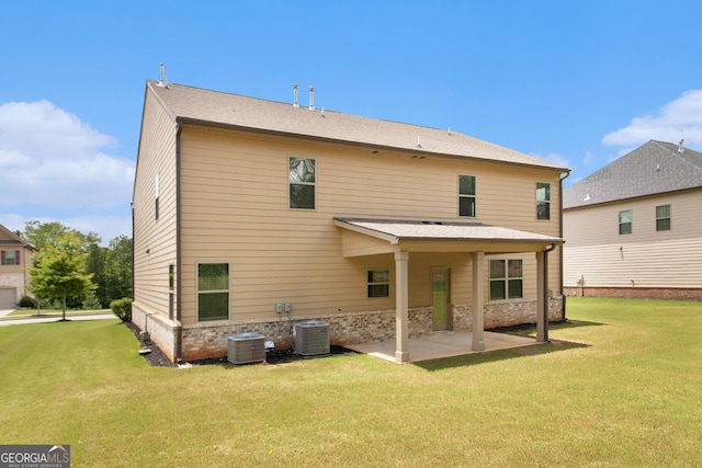 8041 Louis Dr, Locust Grove, GA 30248 - back of house featuring a patio and a yard