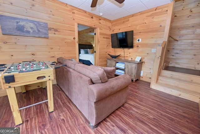 73 Rosiey Ln Unit 356, Blue Ridge, GA 30513 - living area with wood finished floors, a ceiling fan, wooden walls, a drop ceiling, and stairs