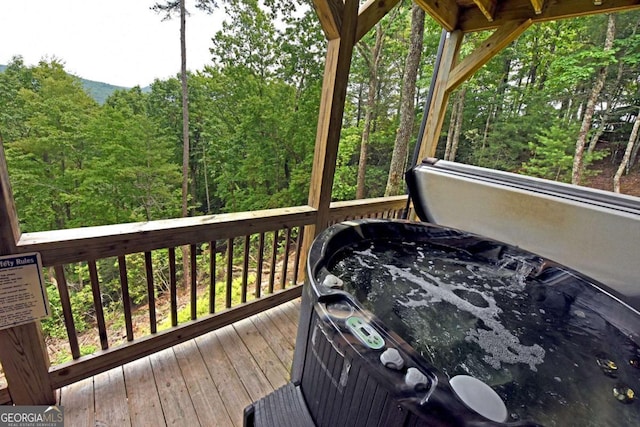 73 Rosiey Ln Unit 356, Blue Ridge, GA 30513 - wooden deck with a hot tub and a forest view
