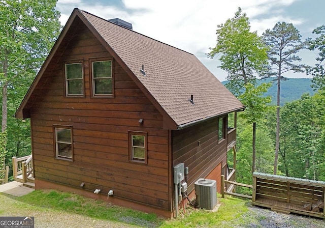 73 Rosiey Ln Unit 356, Blue Ridge, GA 30513 - view of side of home featuring a shingled roof and a central AC unit