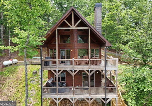 73 Rosiey Ln Unit 356, Blue Ridge, GA 30513 - view of front of home featuring a chimney and a deck