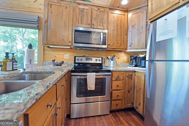 73 Rosiey Ln Unit 356, Blue Ridge, GA 30513 - kitchen featuring appliances with stainless steel finishes, brown cabinetry, dark wood-style floors, and recessed lighting