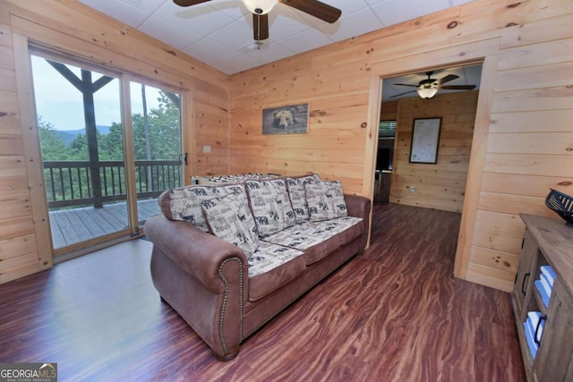 73 Rosiey Ln Unit 356, Blue Ridge, GA 30513 - living area with a ceiling fan, wood walls, dark wood finished floors, and a paneled ceiling