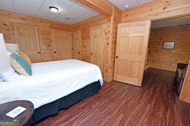 73 Rosiey Ln Unit 356, Blue Ridge, GA 30513 - bedroom featuring wood walls and dark wood-type flooring