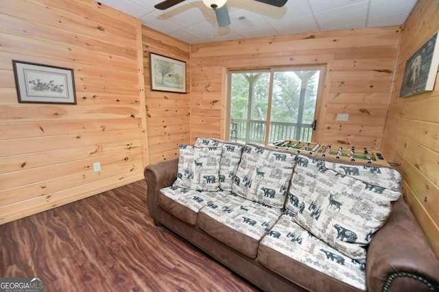 73 Rosiey Ln Unit 356, Blue Ridge, GA 30513 - living area with wooden walls, a ceiling fan, wood finished floors, and a drop ceiling