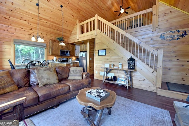 73 Rosiey Ln Unit 356, Blue Ridge, GA 30513 - living room with wood walls, wood ceiling, wood finished floors, high vaulted ceiling, and a ceiling fan