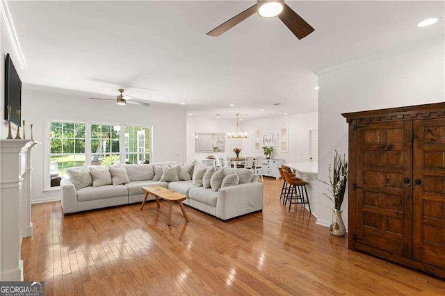 162 Drakes Lndg, Brunswick, GA 31523 - living area featuring a ceiling fan, hardwood / wood-style floors, a chandelier, and recessed lighting
