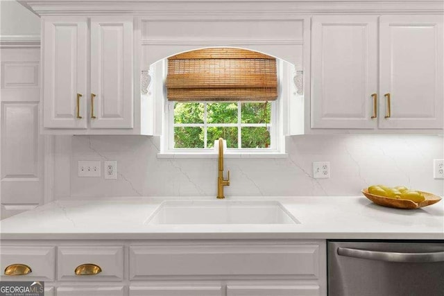 162 Drakes Lndg, Brunswick, GA 31523 - kitchen with dishwasher, white cabinetry, light countertops, and decorative backsplash