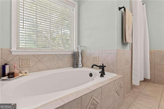 162 Drakes Lndg, Brunswick, GA 31523 - bathroom featuring a garden tub and tile patterned floors